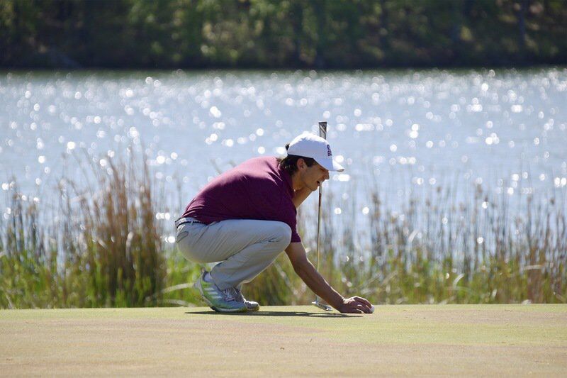 Ada senior Michael Huff sizes up his putt during action at the 2021 Ardmore Invitational Monday at the Dornick Hills Golf Course in Ardmore.