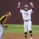Richard R. Barron - The Ada News -- Ada senior Zac Carroll (22) stands on base after hitting a double during a matchup with Tecumseh Thursday night at Cougar Field.