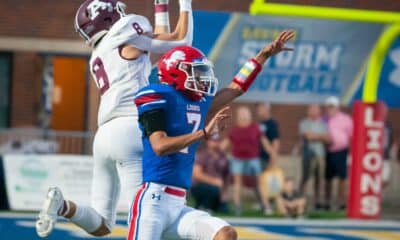 Richard R. Barron | The Ada News -- Ada senior receiver Trey Ivy (8) leaps high over Durant defender Frank Monroy (7) to come down with a huge 46-yard catch that set up the first of three Ada first-quarter touchdowns.