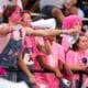 Richard R. Barron | The Ada News -- Ada High School student Wyatt Brown is shown with his arms outstretched as he and his fellow students attend the Ada Cougars "Pink Out Night" home football game against Blanchard Oct. 1.