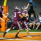 Richard R. Barron | The Ada News -- Ada junior Jagger Caldwell (54) celebrates with some teammates after scoring on a 25-yard fumble return early in the Cougars’ Week 6 matchup with Madill Friday night inside Koi Ishto Stadium. Ada went on to thump the Wildcats 47-14.
